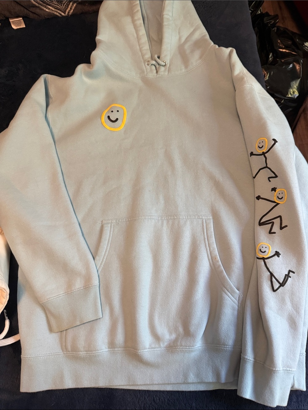 Toms Light Blue Hoodie with Yellow Smiley Graphics
